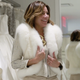 Luann trying on bridal furs. Screenshot via Bravo.